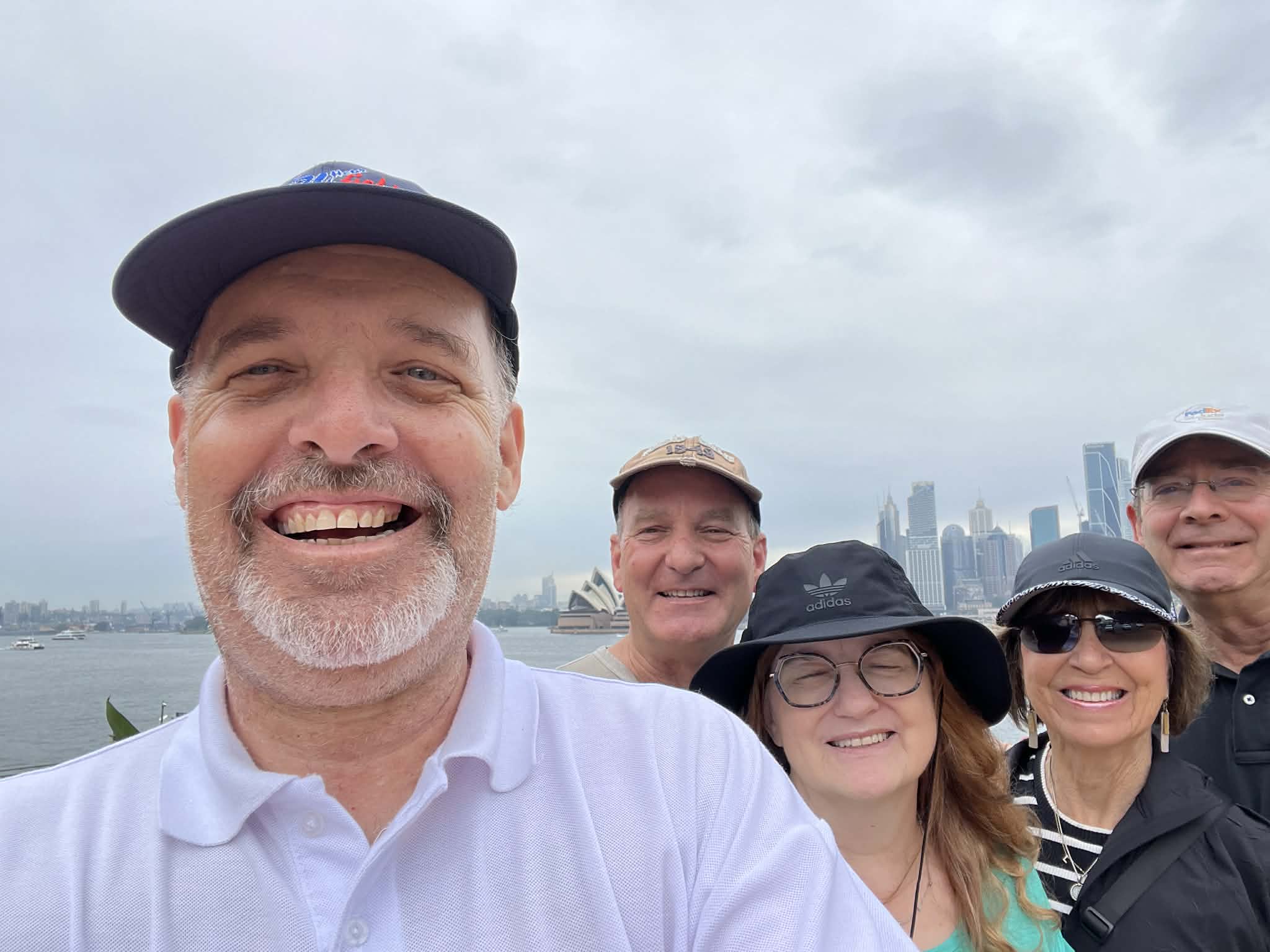 Private guided tour guests with Sydney Harbour and the Opera House behind them